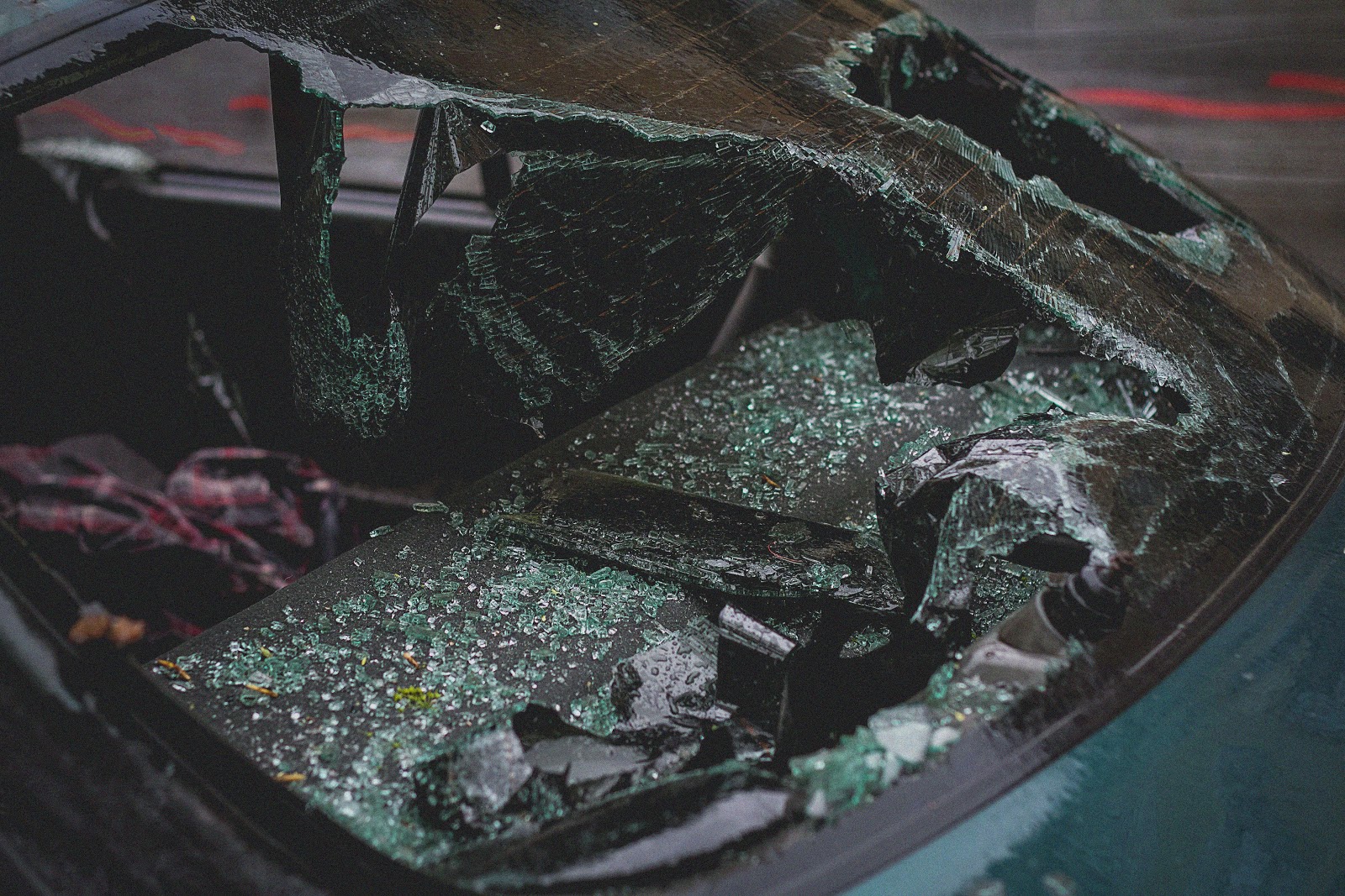 Car with a shattered windshield.